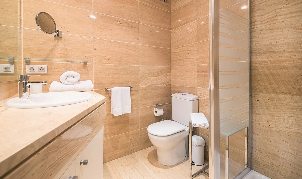 Casa Verdú stone basin and walk-in shower