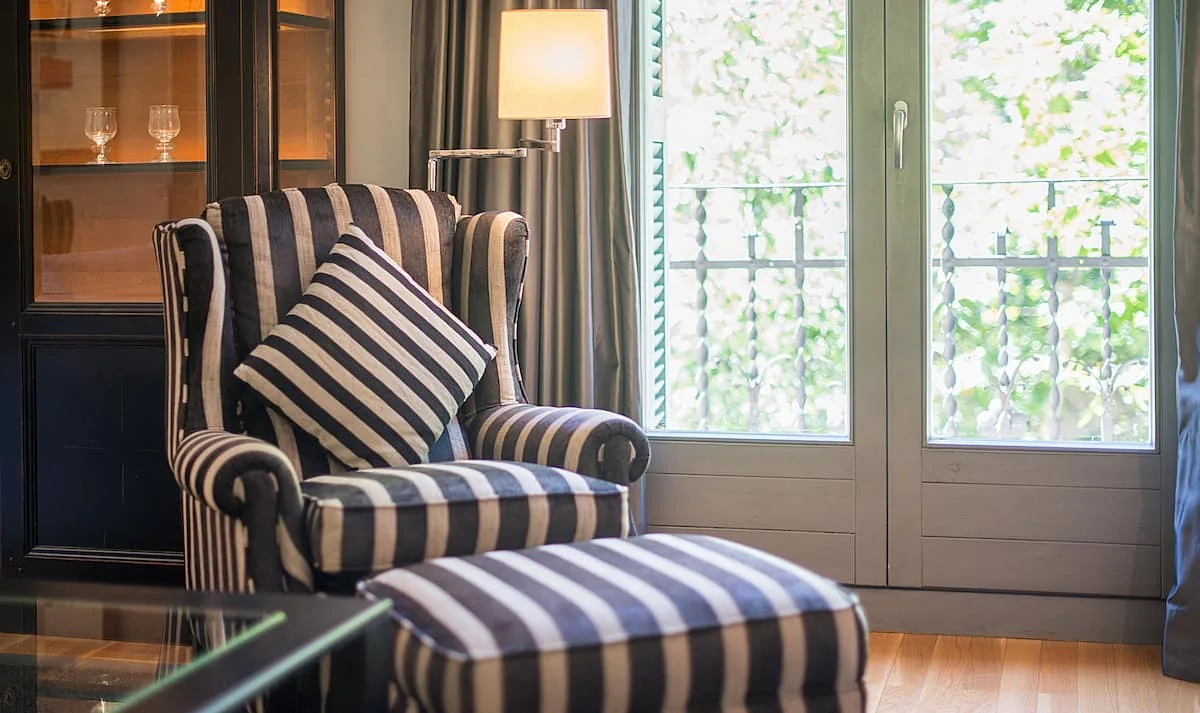 Casa Verdú armchair and balcony doors