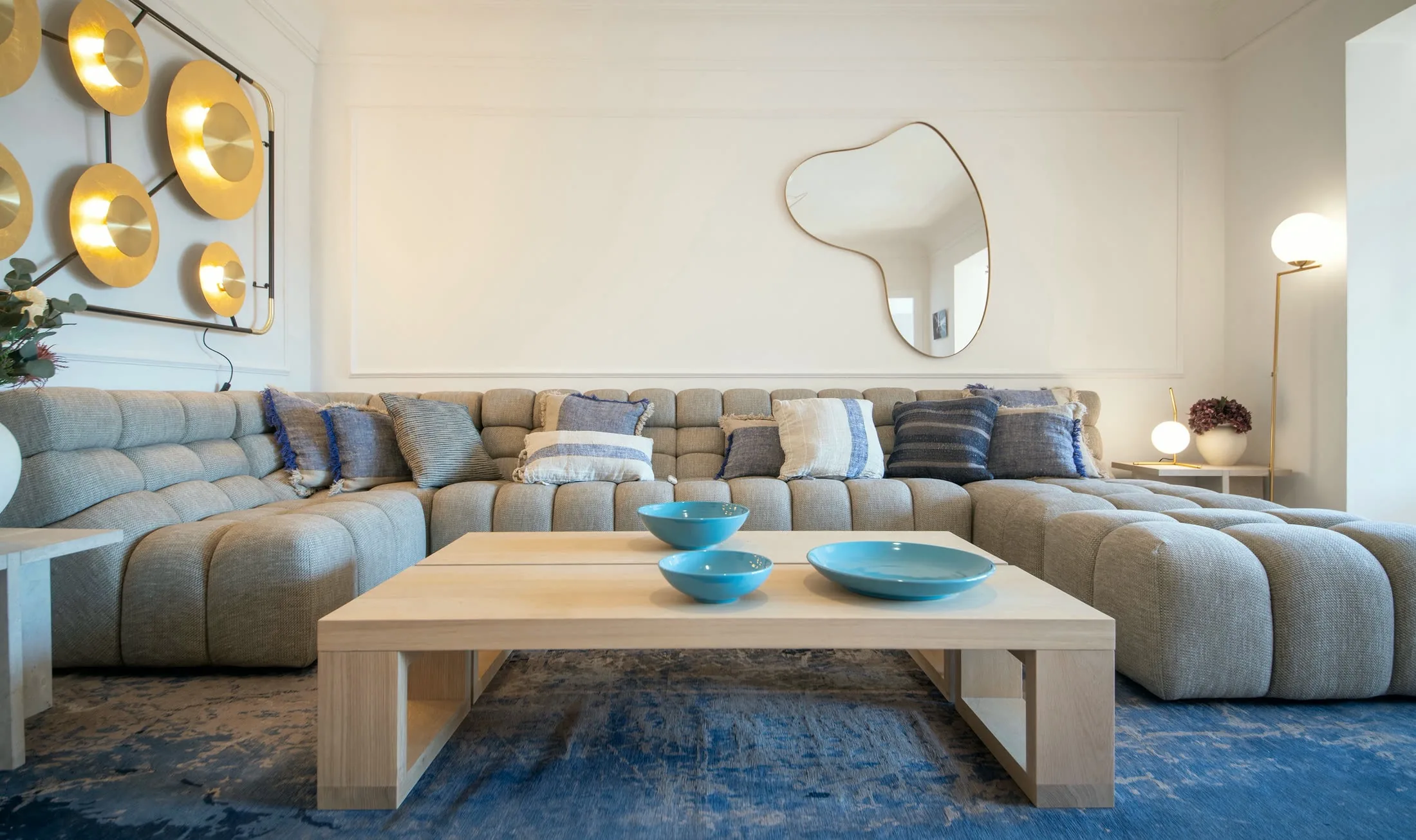 Suite Alba living room with a sofa bed in the sectional seating area