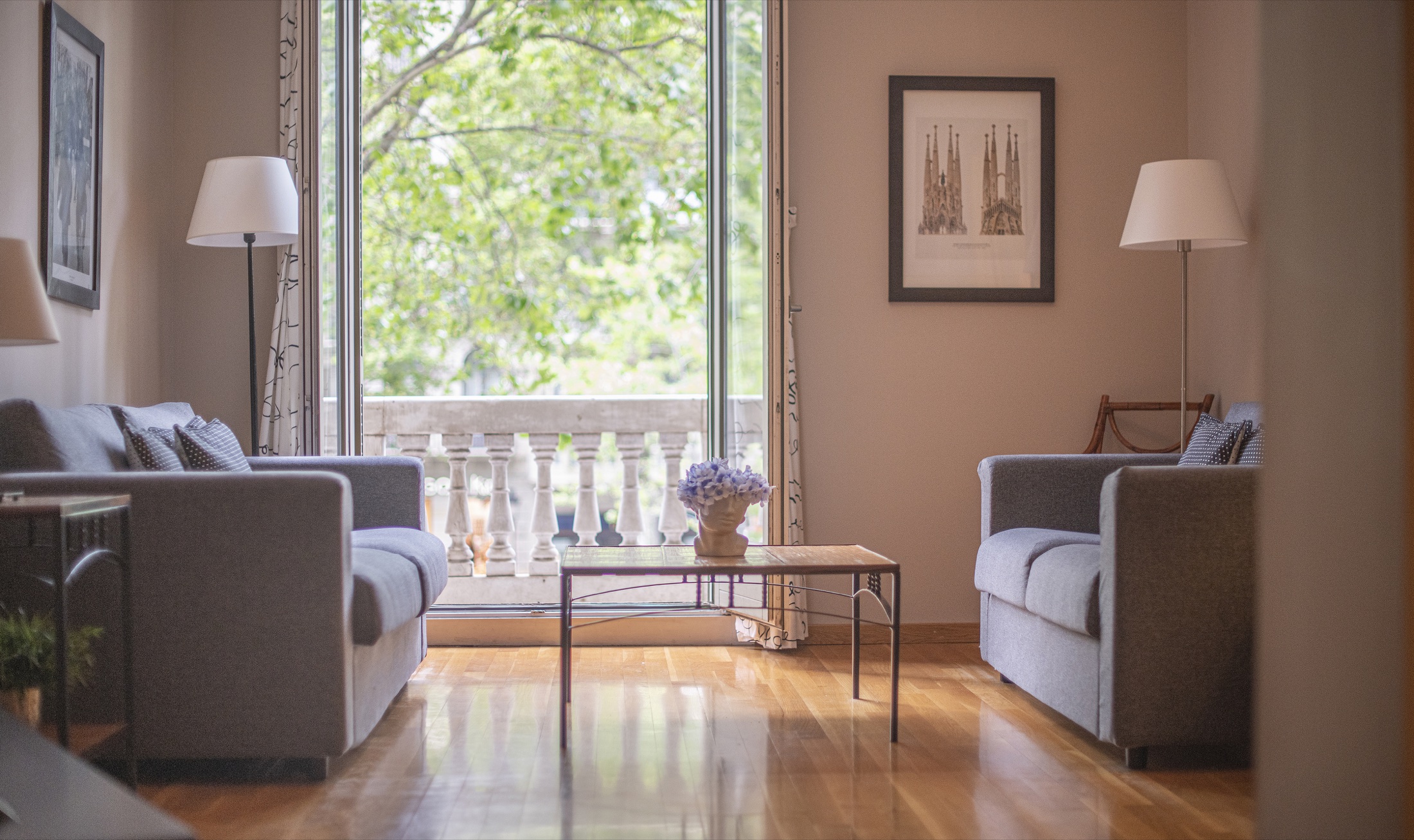 Wide view of the Suite Bella living room and balcony doors