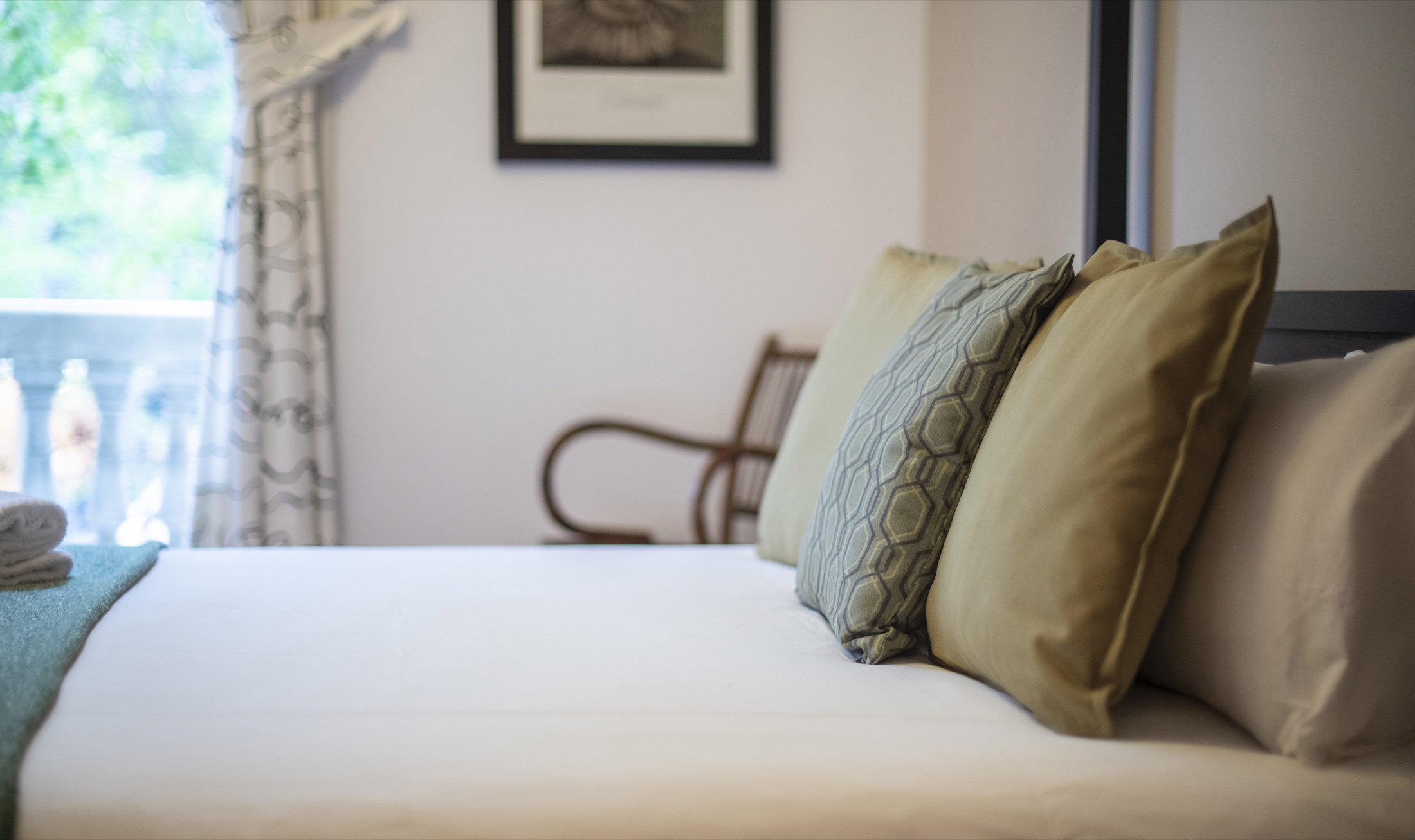 Suite Bella principal bedroom detail with bedroom details and balcony light