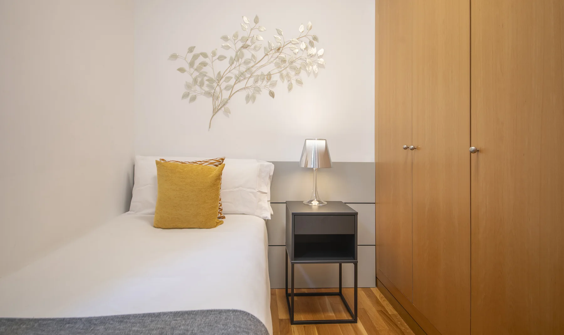 Suite Celia single bedroom with desk and storage 56