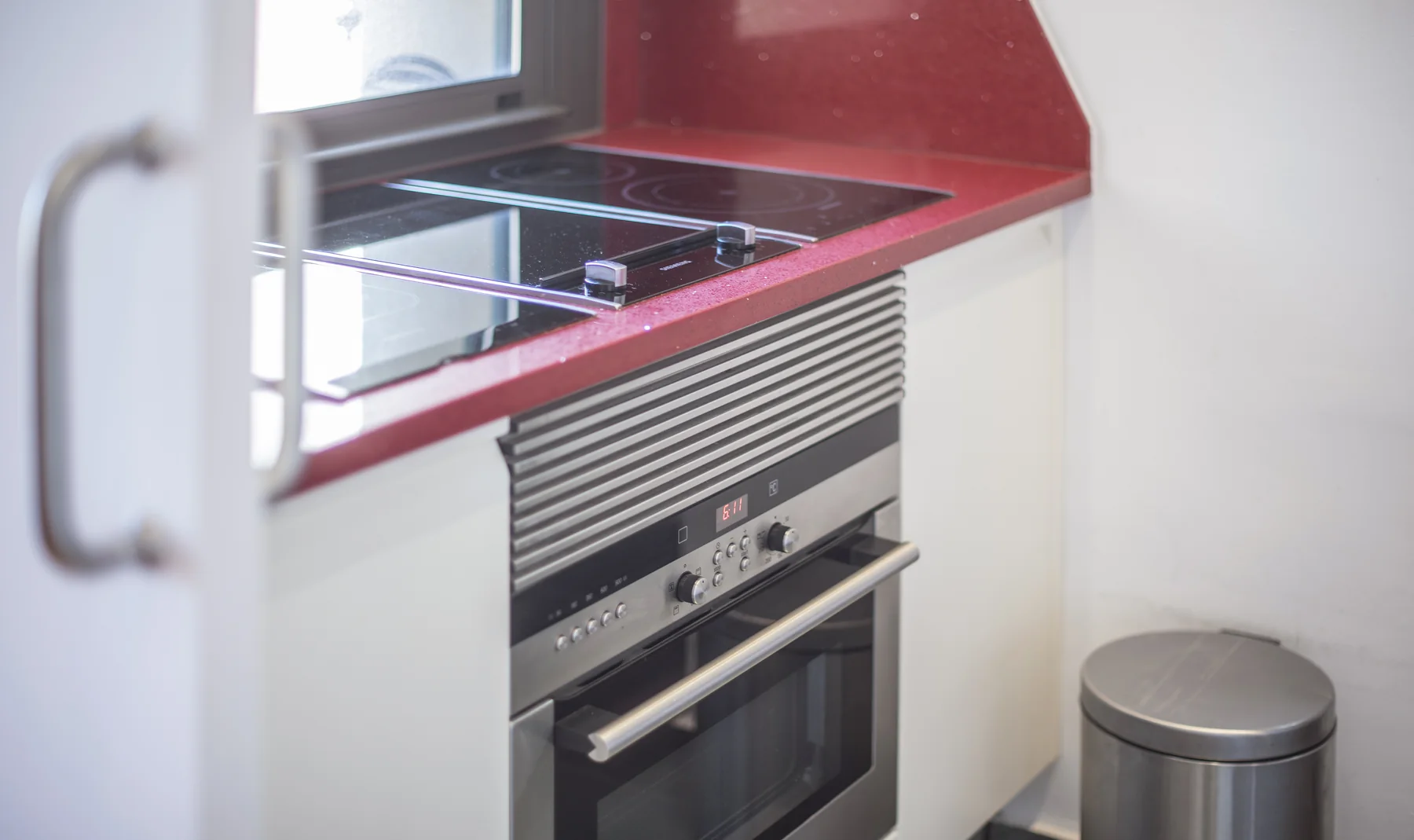 Suite Divina oven and induction cooking area