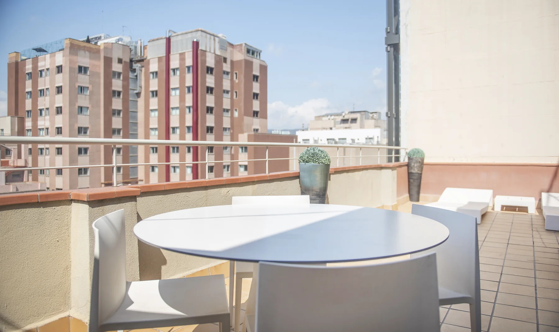 Suite Divina outdoor dining table and city outlook