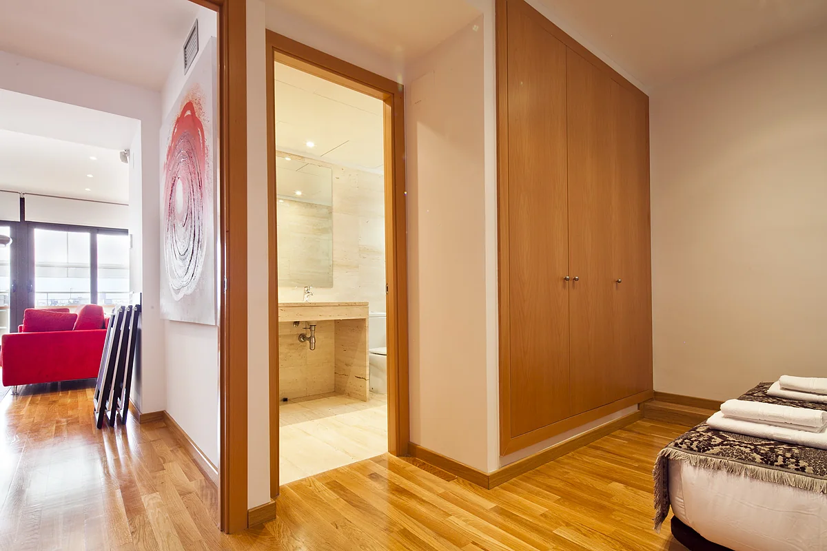 Suite Divina bedroom corridor and wardrobe storage