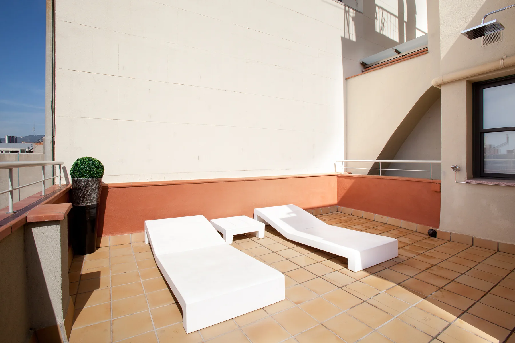 Suite Divina sun loungers in the afternoon light
