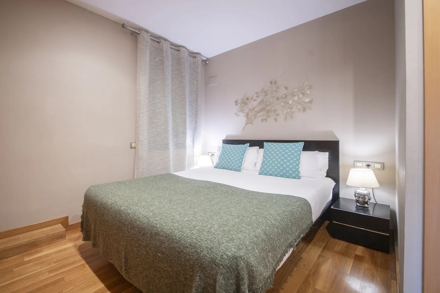 Suite Divina queen bed in soft natural light