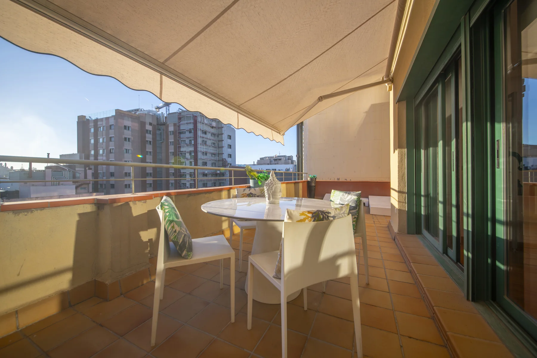 Suite Divina terrace table beneath the awning