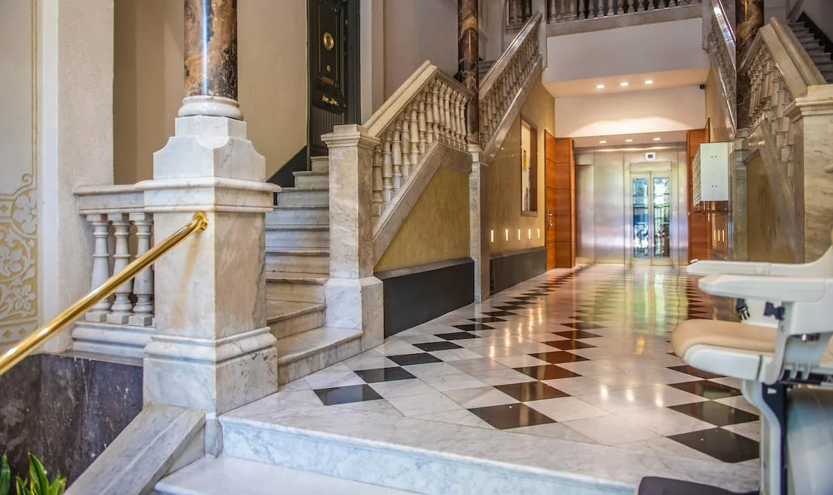 Suite Divina historic staircase and entrance hall