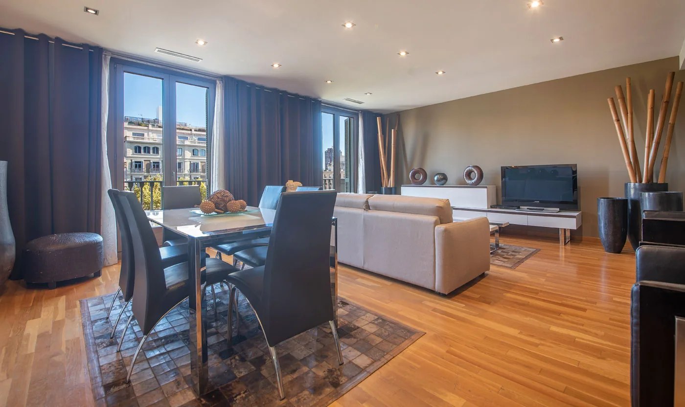 Open-plan living and dining room overlooking Passeig de Gr&agrave;cia