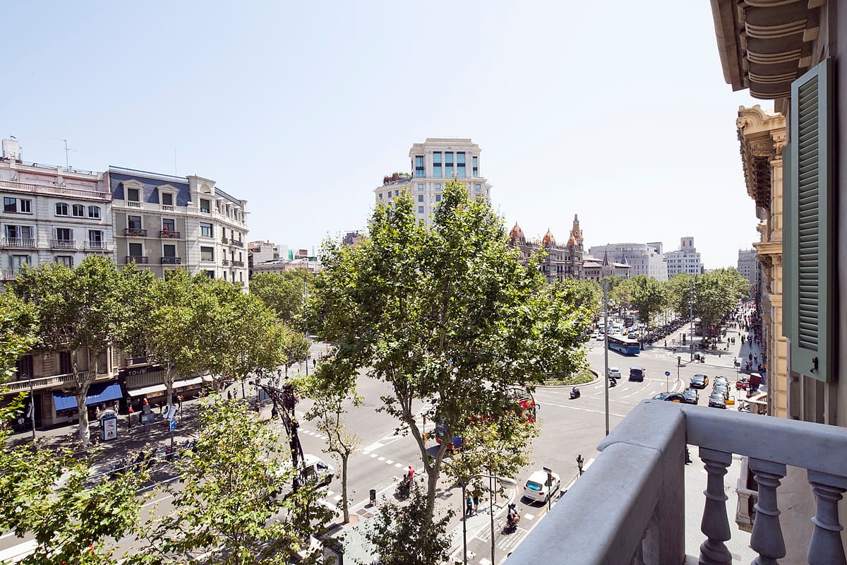 Long balcony outside Suite Sagrada overlooking central Barcelona