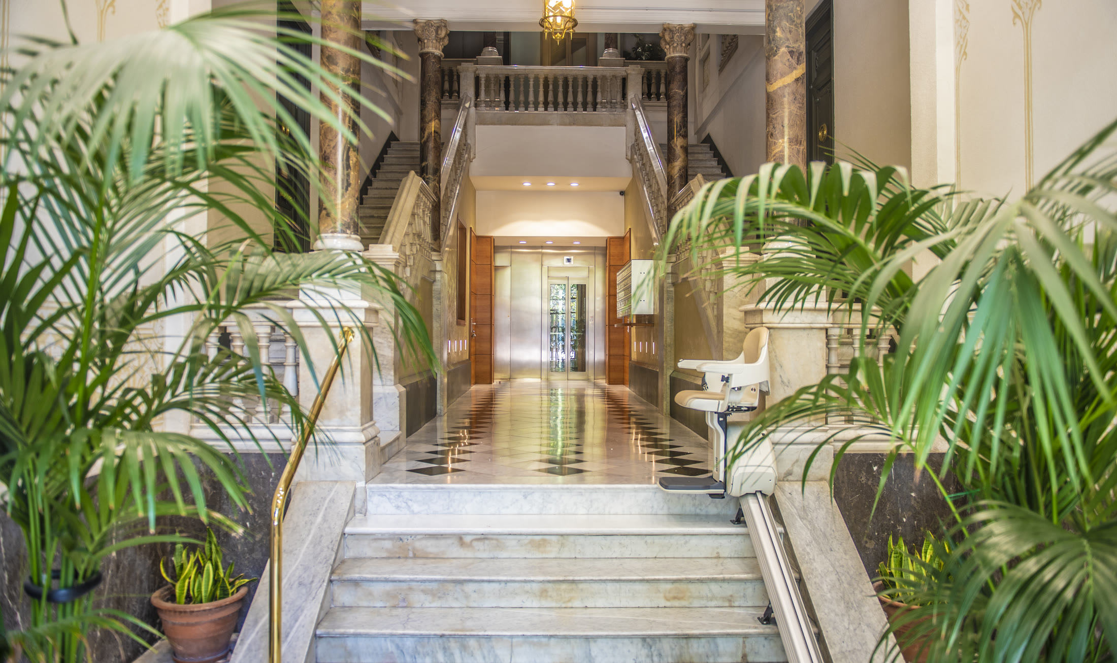 Palm-filled entrance inside the PDG15 building