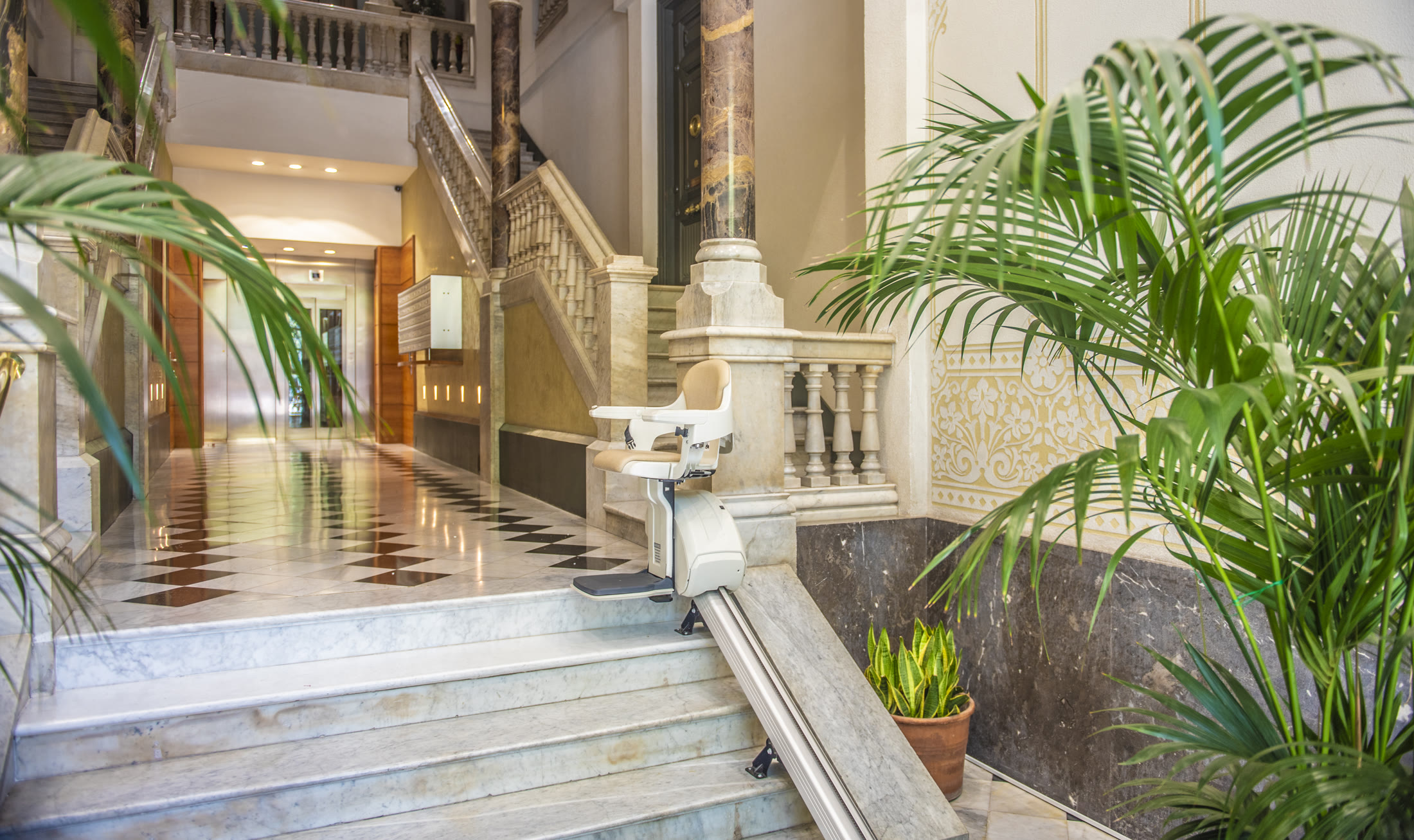 Marble staircase and chequered floor inside the PDG15 entrance
