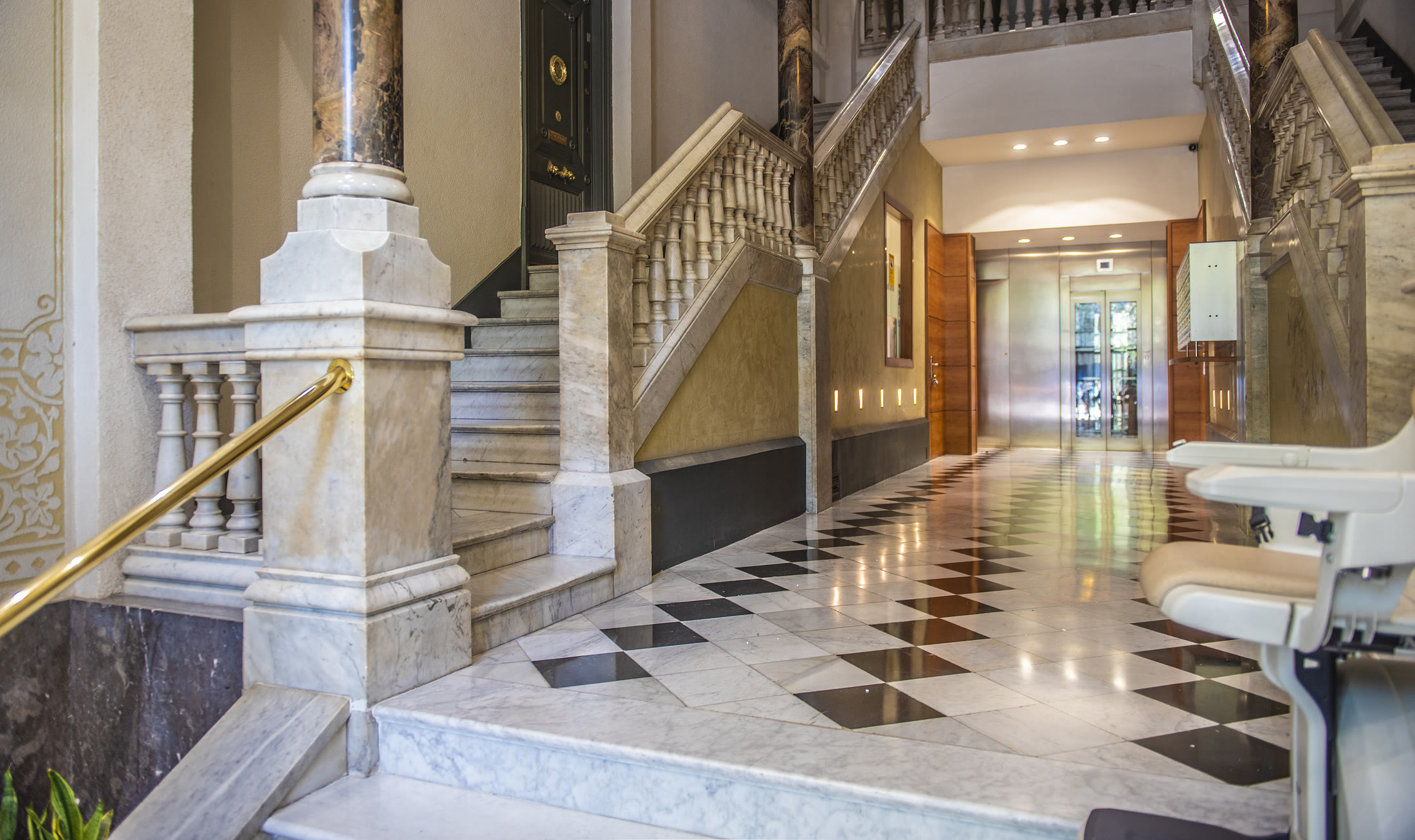 Historic entrance hall and staircase at Passeig de Gr&agrave;cia 15